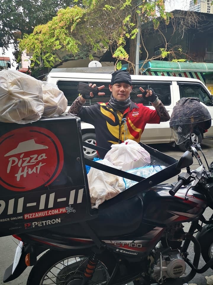 Pizza delivery rider Raymund Papellero